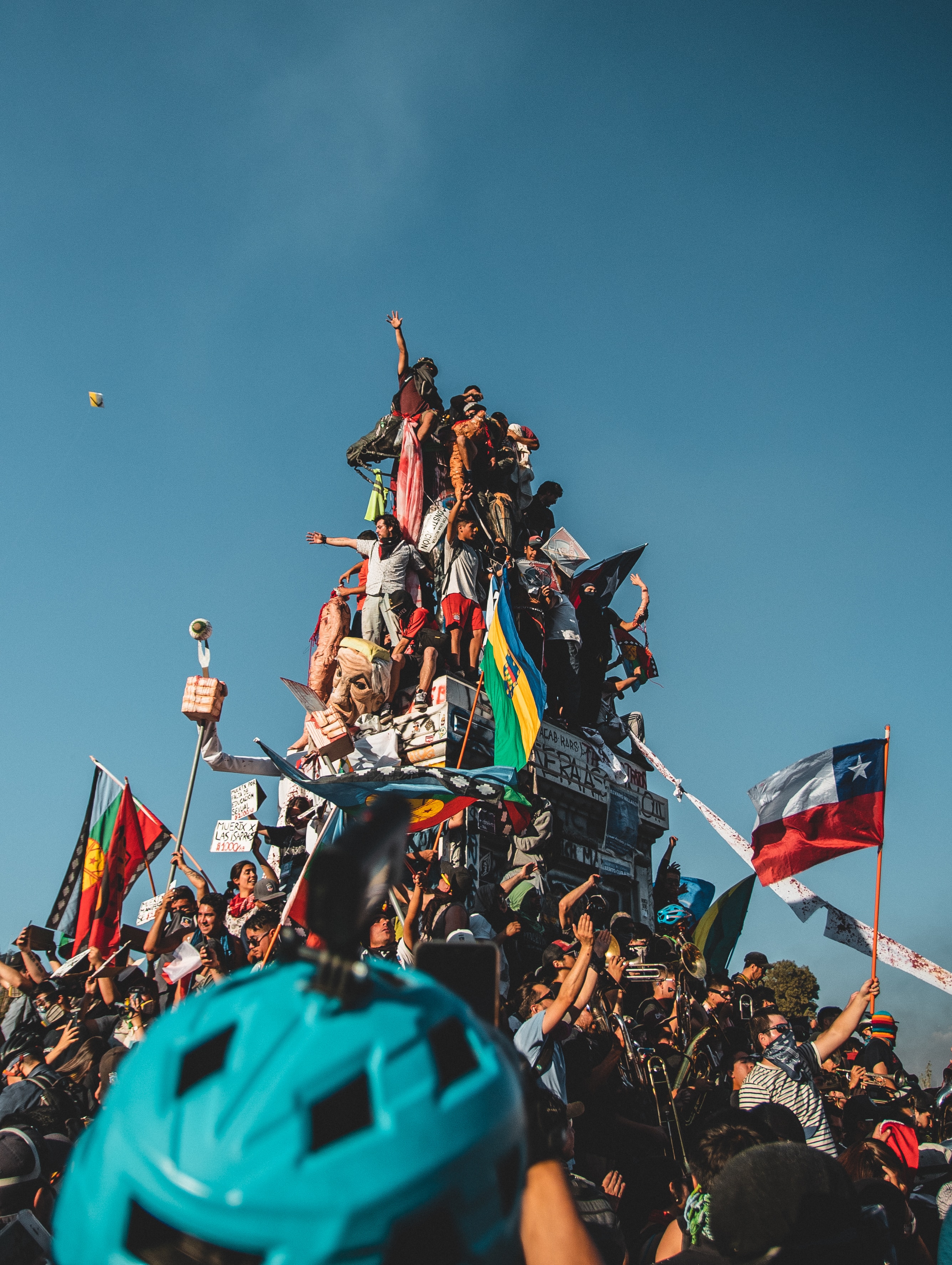people on top of parade